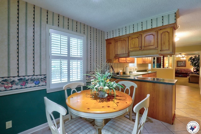 21 Holly Ridge Dr, Texarkana, TX 75503 - dining room with a textured ceiling, wallpapered walls, and light tile patterned flooring