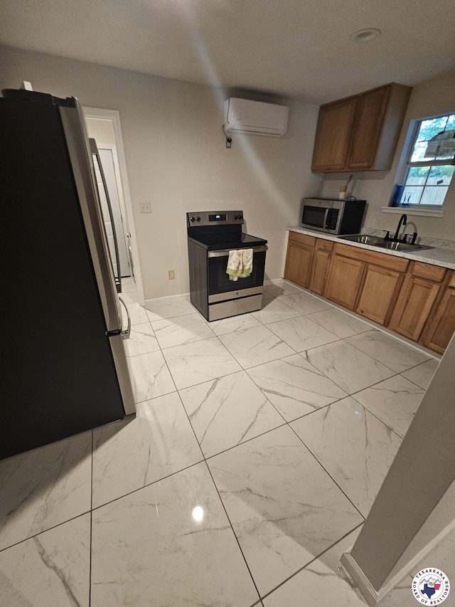 3514 Magnolia St, Texarkana, TX 75501 - kitchen with appliances with stainless steel finishes, an AC wall unit, light marble finish floors, and brown cabinets