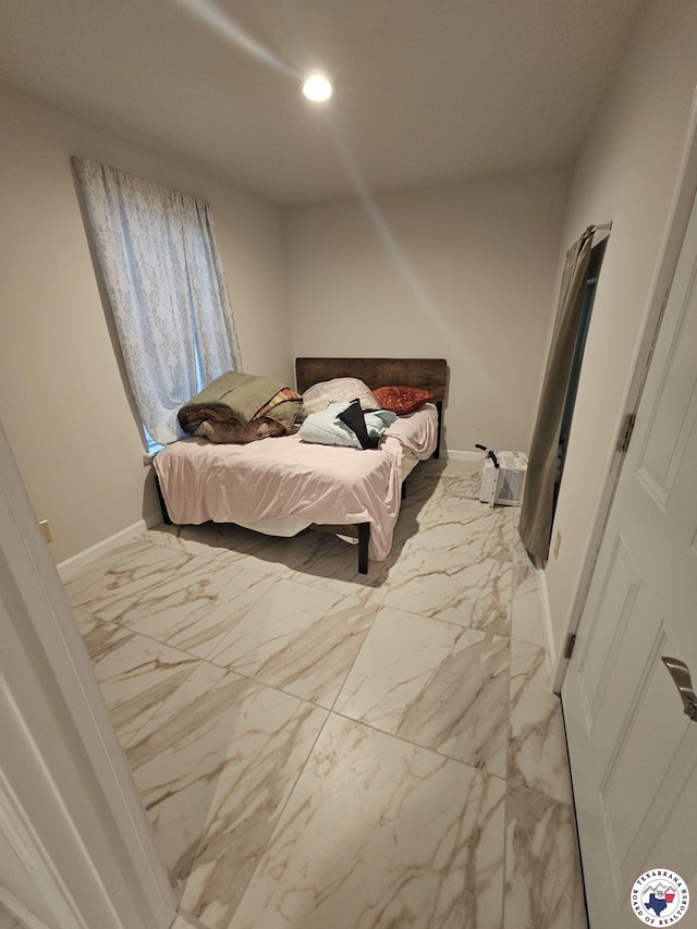 3514 Magnolia St, Texarkana, TX 75501 - bedroom featuring light marble finish floors and recessed lighting