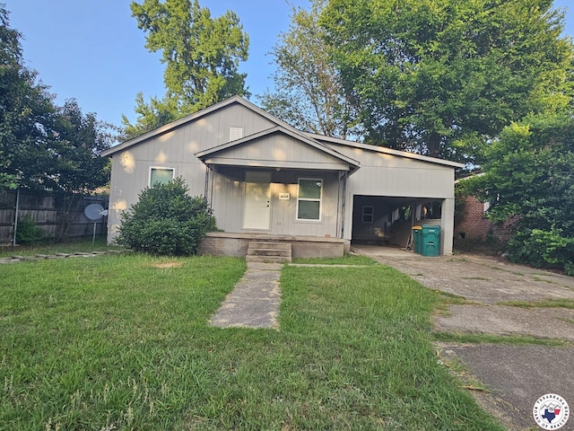 3514 Magnolia St, Texarkana, TX 75501 - bungalow-style home featuring concrete driveway, covered porch, and a carport