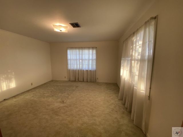 view of carpeted spare room