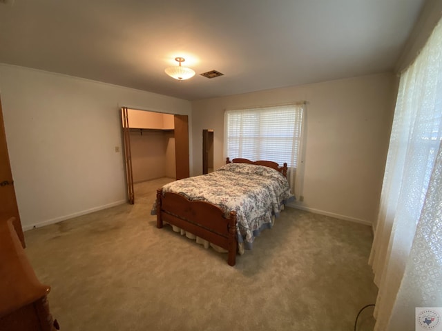 carpeted bedroom with a closet