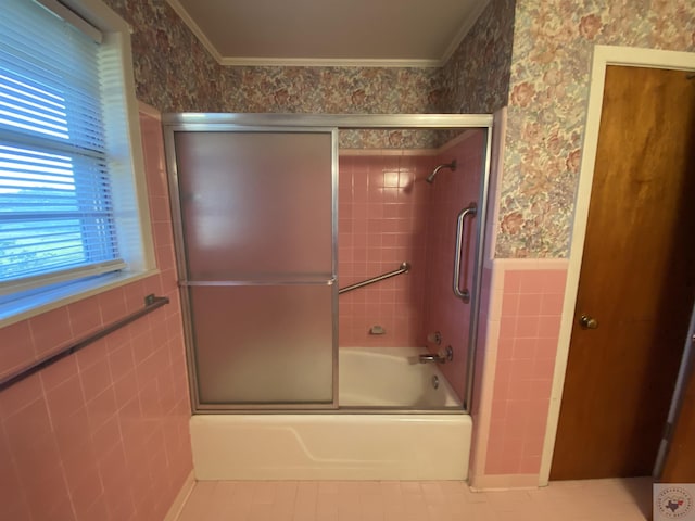 bathroom featuring shower / bath combination with glass door, crown molding, and tile patterned flooring