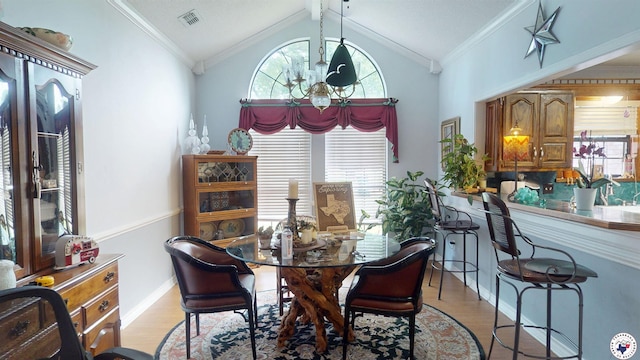 122 David Dr, New Boston, TX 75570 - dining space featuring light wood-type flooring, healthy amount of natural light, lofted ceiling, ornamental molding, and baseboards