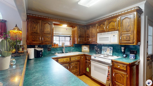 122 David Dr, New Boston, TX 75570 - kitchen featuring white appliances, a sink, backsplash, ornamental molding, and brown cabinetry
