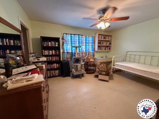 184 E Elliott Ln, Dekalb, TX 75559 - carpeted bedroom with ornamental molding and a ceiling fan
