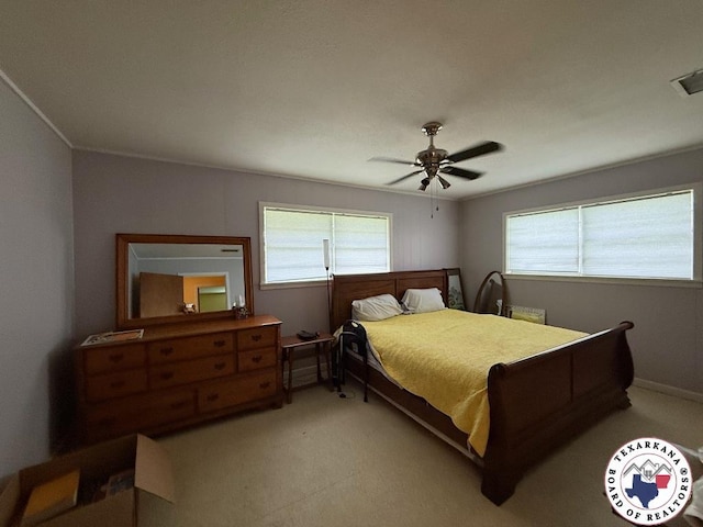 184 E Elliott Ln, Dekalb, TX 75559 - bedroom featuring light colored carpet and ceiling fan