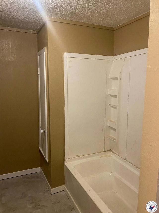 100 Roosevelt St, Hooks, TX 75561 - full bath featuring a textured ceiling and washtub / shower combination