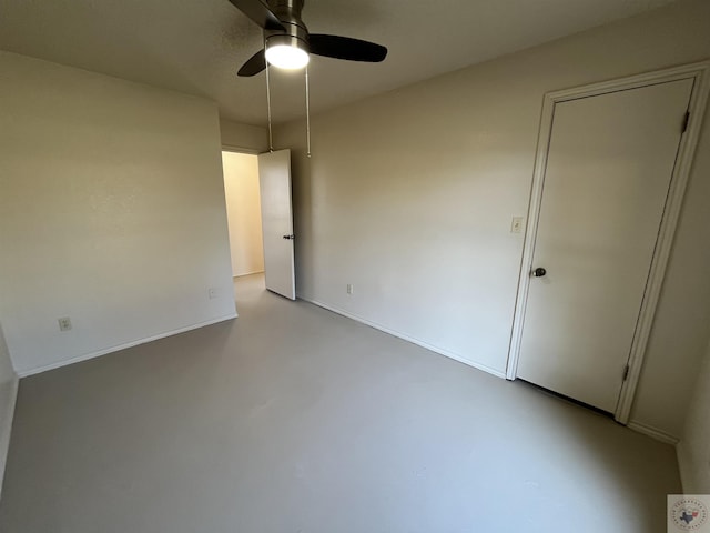 spare room with ceiling fan