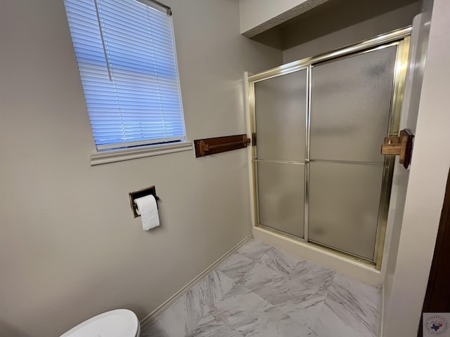 bathroom featuring an enclosed shower