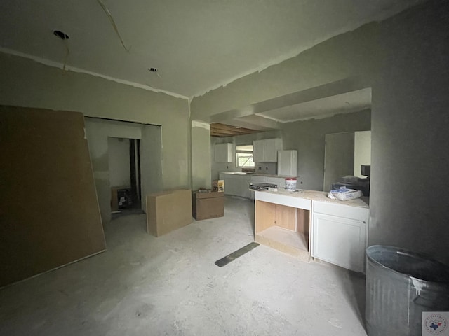 kitchen with white cabinetry