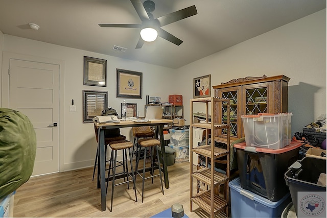 office area featuring light wood-type flooring and ceiling fan