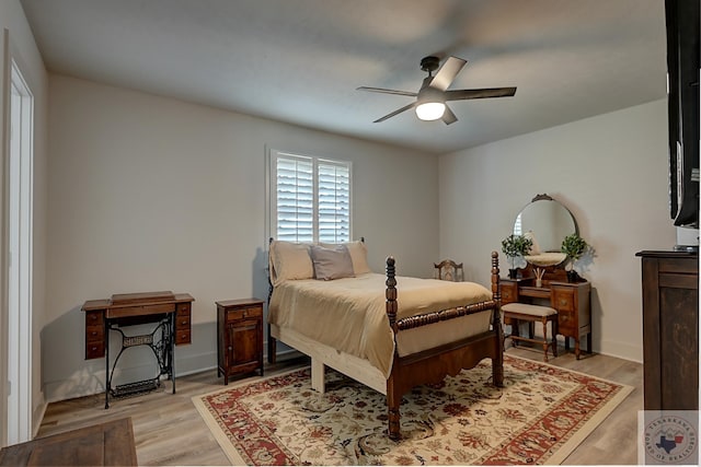 bedroom featuring ceiling fan and light wood-type flooring