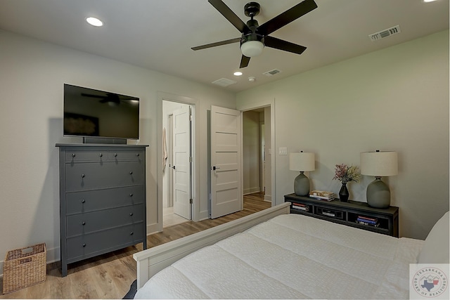 bedroom featuring light wood-type flooring and ceiling fan