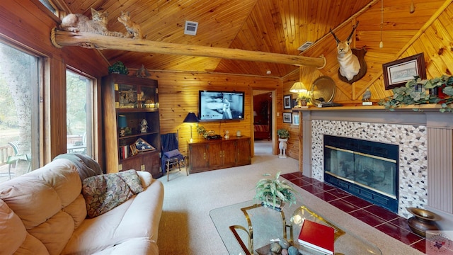 320 Riverside Dr, Horatio, AR 71842 - living room featuring wooden ceiling, wood walls, a tiled fireplace, and lofted ceiling with beams
