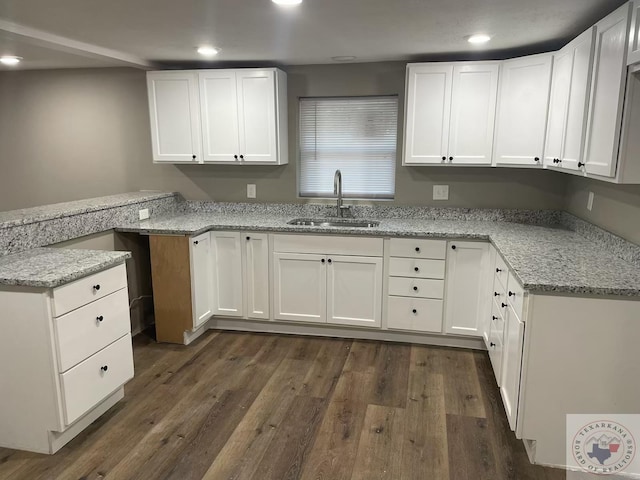 kitchen featuring white cabinets