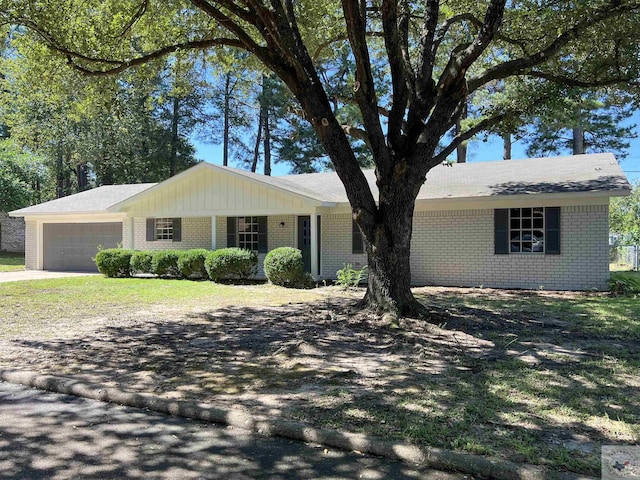 ranch-style home with a garage