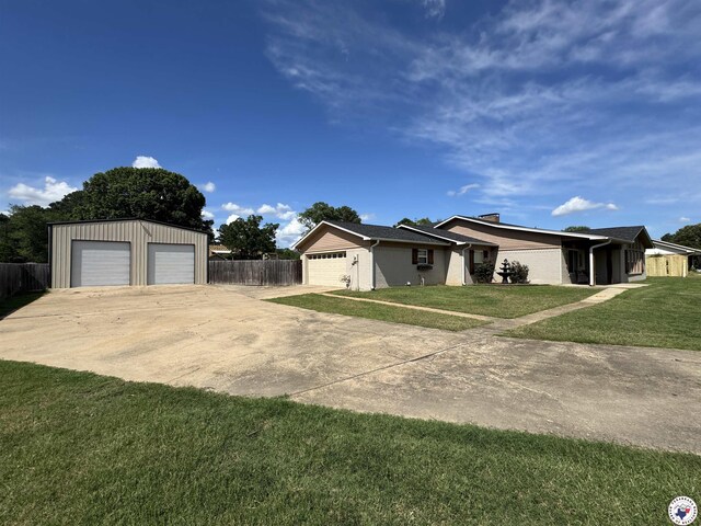 6515 N Kings Hwy, Texarkana, TX 75503 - view of home's exterior with a garage