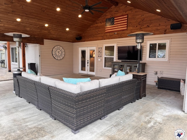 6515 N Kings Hwy, Texarkana, TX 75503 - living area featuring carpet, a ceiling fan, wood walls, recessed lighting, and high vaulted ceiling