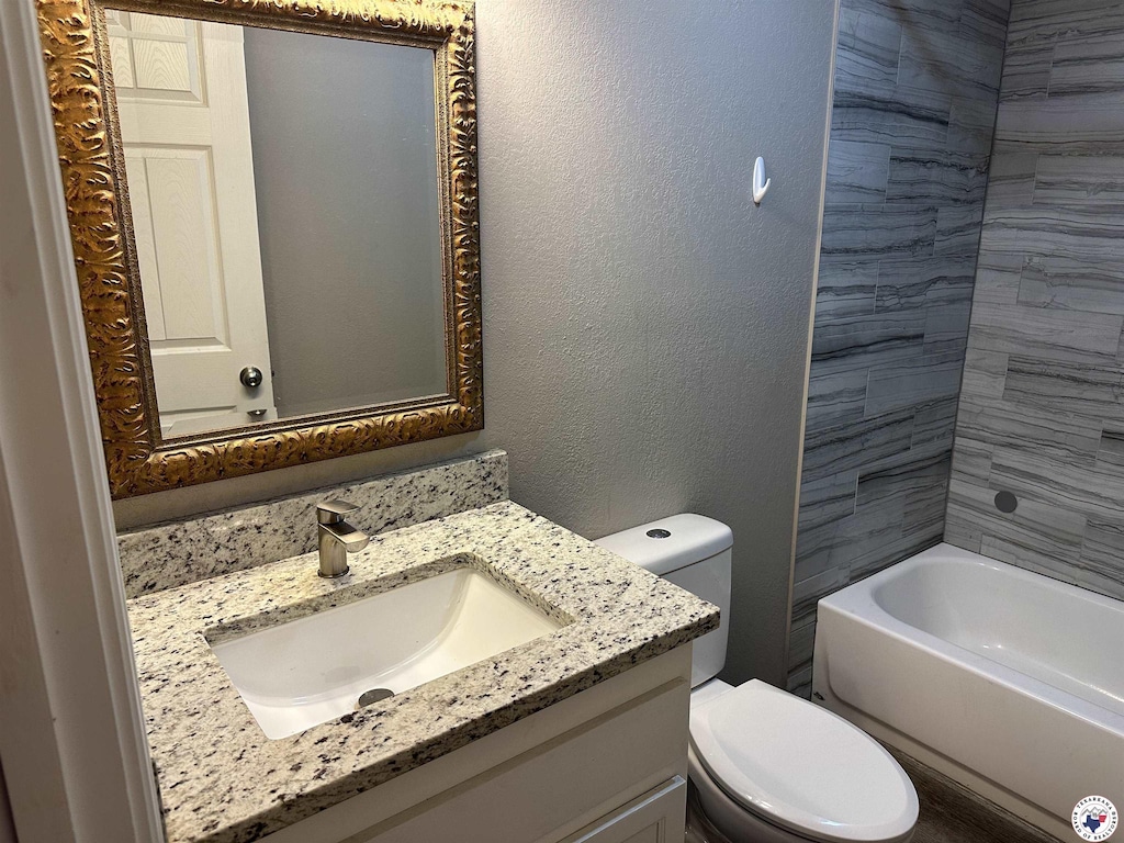 441 Johnson St, Nash, TX 75569 - full bath featuring vanity, a textured wall, and shower / washtub combination