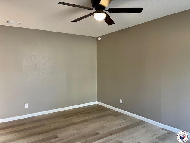 1 Sidney Dr, Texarkana, TX 75503 - empty room featuring a ceiling fan, baseboards, and wood finished floors