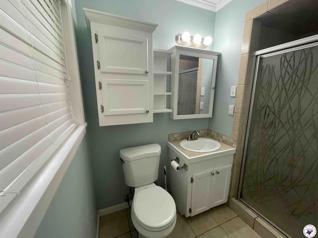 3123 Hickory St, Texarkana, AR 71854 - bathroom featuring vanity, tile patterned floors, a stall shower, and ornamental molding