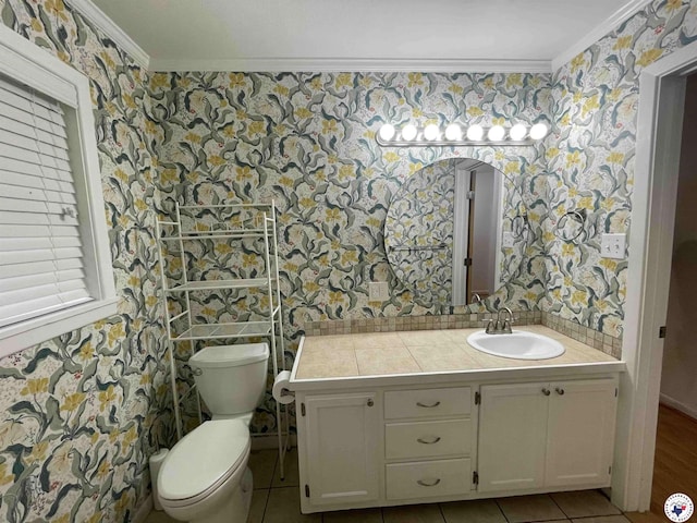 3123 Hickory St, Texarkana, AR 71854 - bathroom featuring wallpapered walls, ornamental molding, vanity, and tile patterned flooring