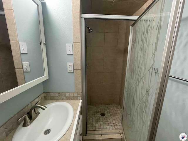 3123 Hickory St, Texarkana, AR 71854 - bathroom featuring a stall shower, vanity, and tile patterned floors