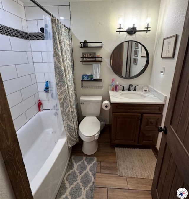 24075 US Highway 59 N, Queen City, TX 75551 - bathroom with toilet, wood finished floors, vanity, and shower / bath combo with shower curtain