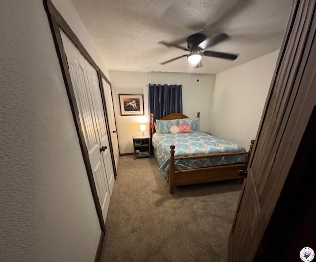24075 US Highway 59 N, Queen City, TX 75551 - carpeted bedroom with a textured ceiling and a ceiling fan