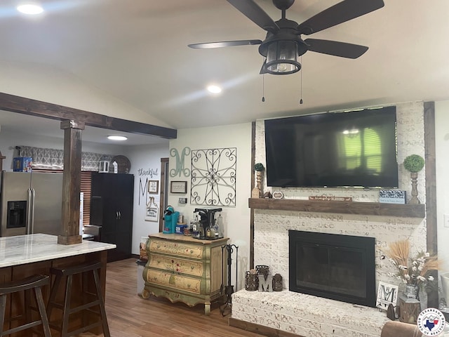 24075 US Highway 59 N, Queen City, TX 75551 - living room featuring wood finished floors, a ceiling fan, vaulted ceiling, decorative columns, and recessed lighting