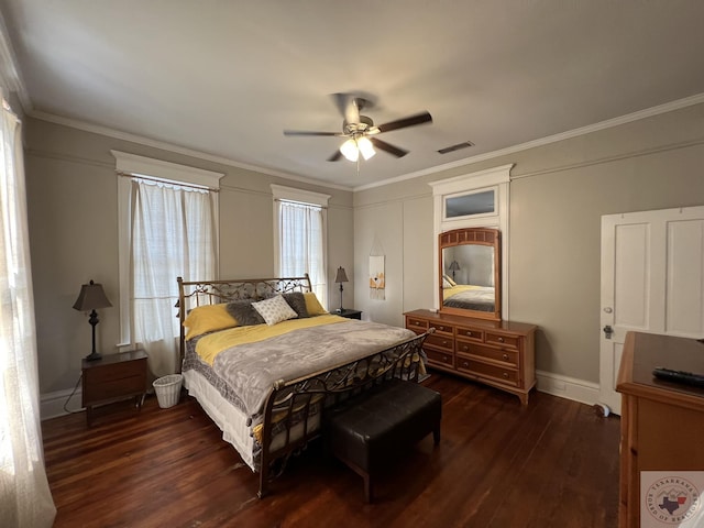 bedroom featuring dark hardwood / wood-style floors, ceiling fan, and ornamental molding