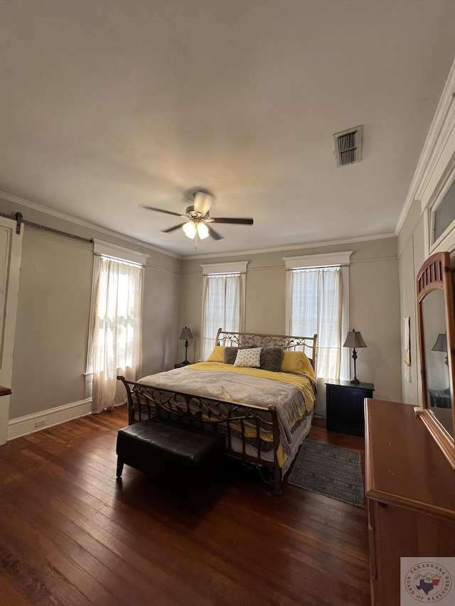 bedroom with ceiling fan, dark hardwood / wood-style floors, and ornamental molding