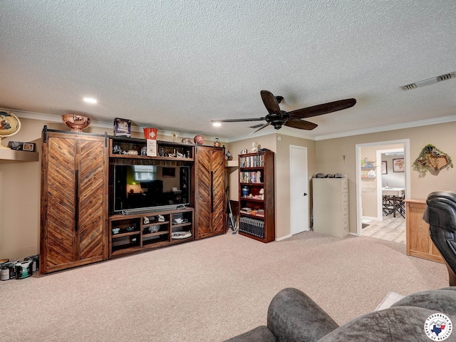 1216 Lavaca Ave, Texarkana, TX 75503 - living room featuring ornamental molding, carpet floors, a ceiling fan, a textured ceiling, and recessed lighting