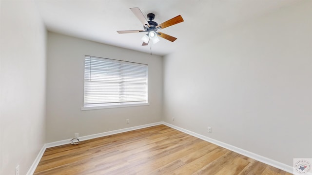 spare room featuring ceiling fan and light hardwood / wood-style flooring