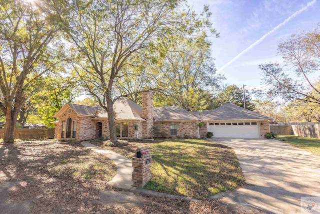 ranch-style home with a garage