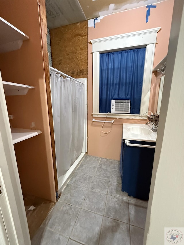 full bathroom featuring tile patterned flooring, a shower with shower curtain, cooling unit, and vanity