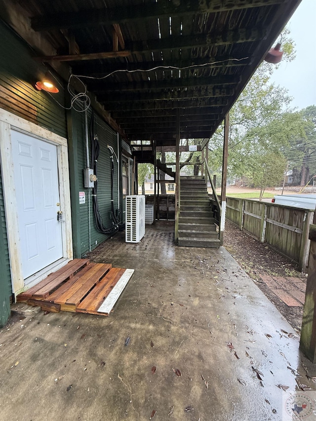 view of patio / terrace featuring stairway