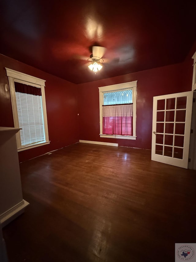 unfurnished room featuring dark hardwood / wood-style floors