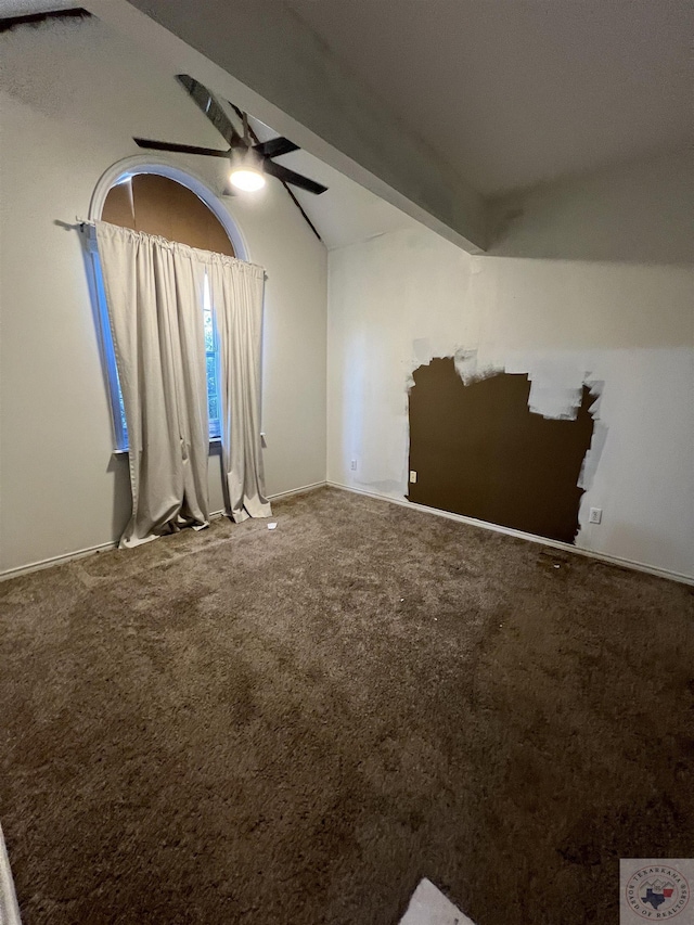 additional living space featuring ceiling fan, vaulted ceiling with beams, and carpet floors
