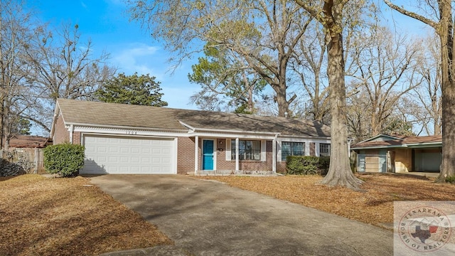 ranch-style home featuring a garage