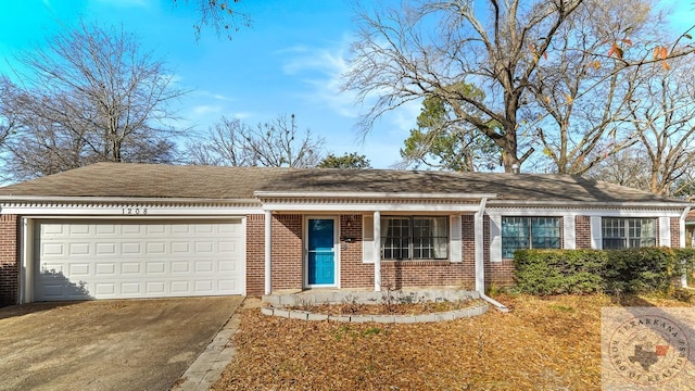 ranch-style home with a garage