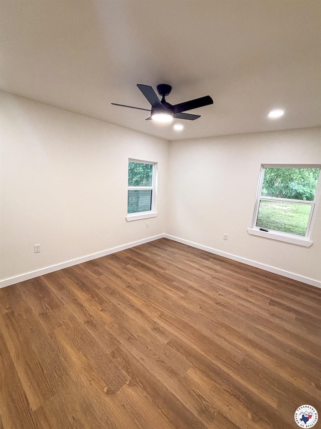 309 N Frost St, New Boston, TX 75570 - unfurnished room featuring healthy amount of natural light, a ceiling fan, wood finished floors, and recessed lighting
