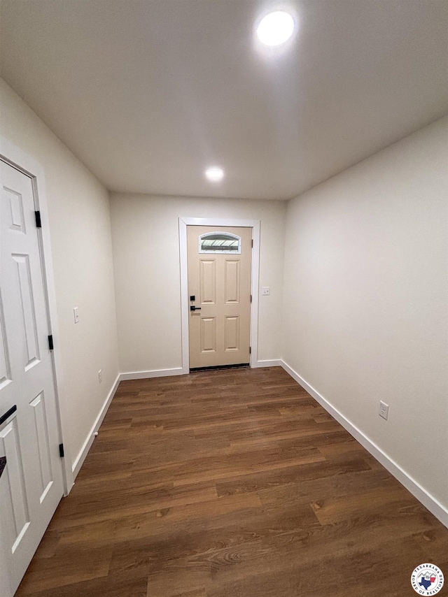 309 N Frost St, New Boston, TX 75570 - doorway featuring dark wood-type flooring and recessed lighting