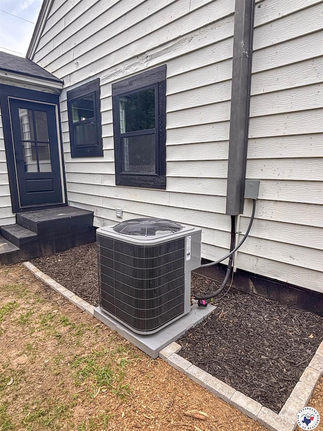 309 N Frost St, New Boston, TX 75570 - exterior view of a central AC unit