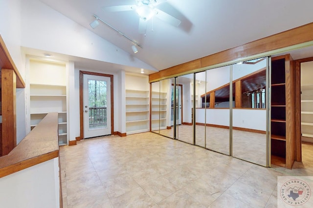 interior space featuring ceiling fan