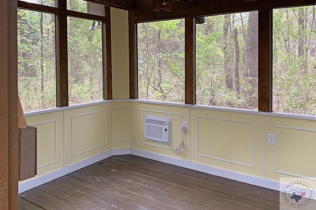 unfurnished sunroom featuring a wealth of natural light