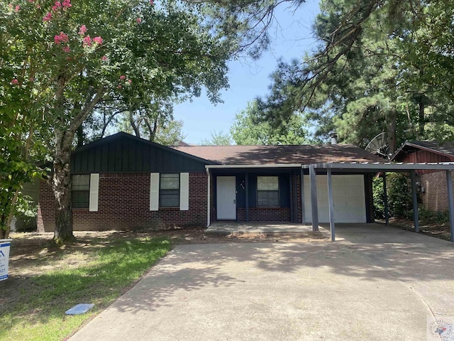 ranch-style home with a carport and a garage