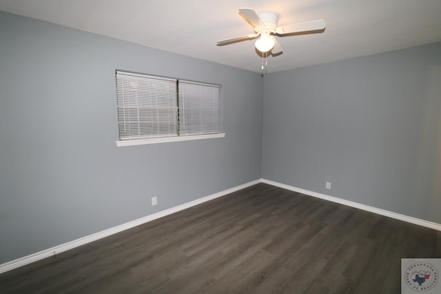 unfurnished room featuring ceiling fan and dark hardwood / wood-style floors