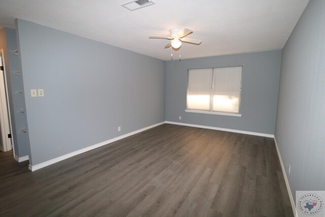 unfurnished room with dark hardwood / wood-style floors and ceiling fan